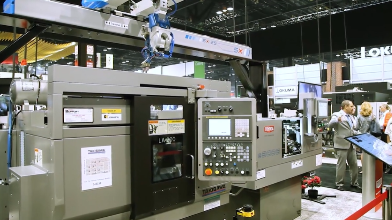 IMTS 2016 e300G Grinding Machine with gantry load system and Takisawa LA-200 Turning Center